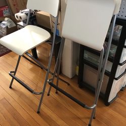 White Set Of High Folded Bar Height Chairs 