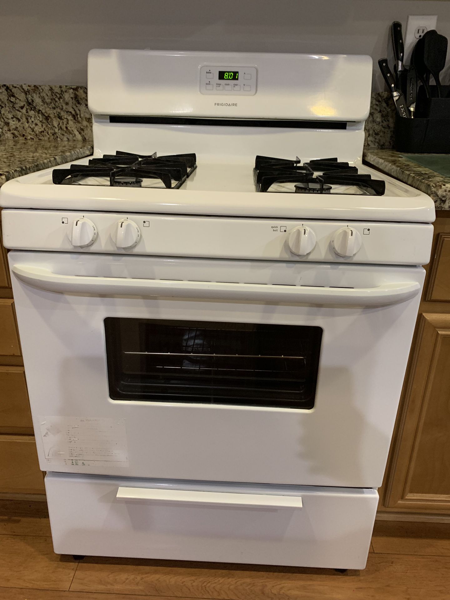 Kitchen Appliances: Gas stove, microwave, and dishwasher