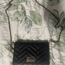 Bebe black quilted bag