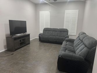 Dark grey and black sofa set