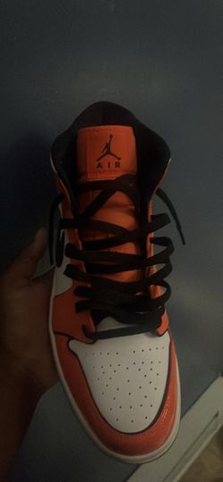 white and a little bit of black Jordan 1 orange and white and a little bit of black