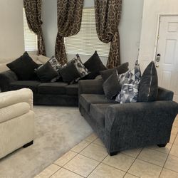 2 Couches With Pillows 