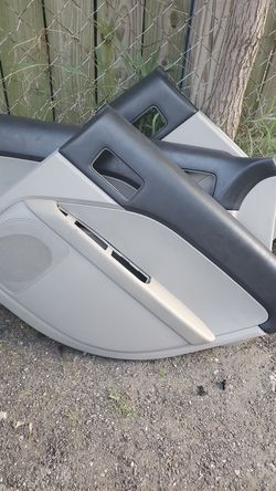 07 mercury milan door panels
