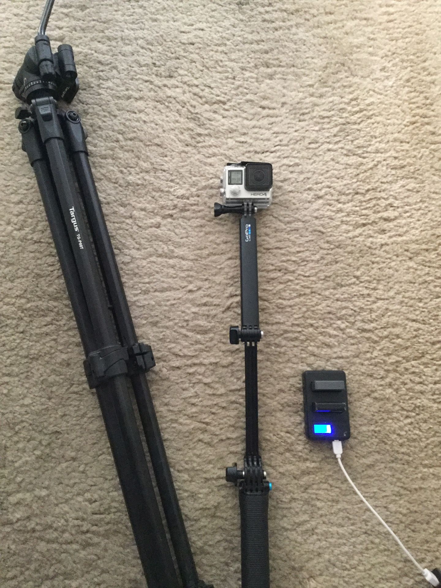A NEW GOPRO HERO 4 with 2 EXTRA BATTERIES & CHARGER/ COMBINED WITH A TARGUS TG-P60T TRI POD!!!