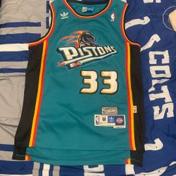 Detroit Pistons Hardwood Classics Grant Hill Medium Jersey, Clayton Kershaw Stitched Blue Dodgers 2XL Jersey, And Paul Skenes Stitched Pirates 2XL 
