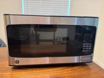GE 1.1 cu. ft. Stainless Steel Countertop Microwave - Like New