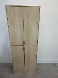 Tall Wood Grain Cabinet with Gold Handles