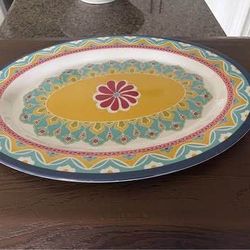 Oval extra large plate with vibrant patterns and floral design. Certified International Valencia