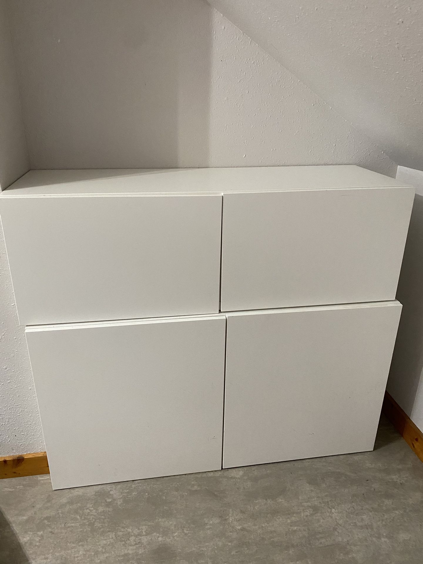 Two White IKEA Cabinets