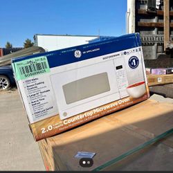 GE 2.0-cu ft 1200 - Watt Countertop Microwave (White )