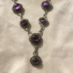 Sterling silver with a beautiful amethyst 