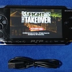 PSP With Charger And Games Inside 