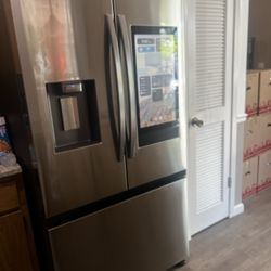 Refrigerator With Ice Maker And Smart Panel