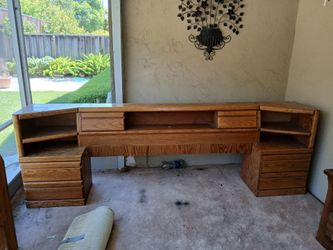 Headboard with attached nightstands