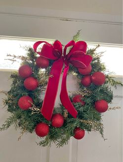 Christmas Wreath with Red Ornaments and Bow