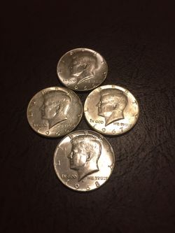 Lot of (4) Kennedy Half Silver Dollars