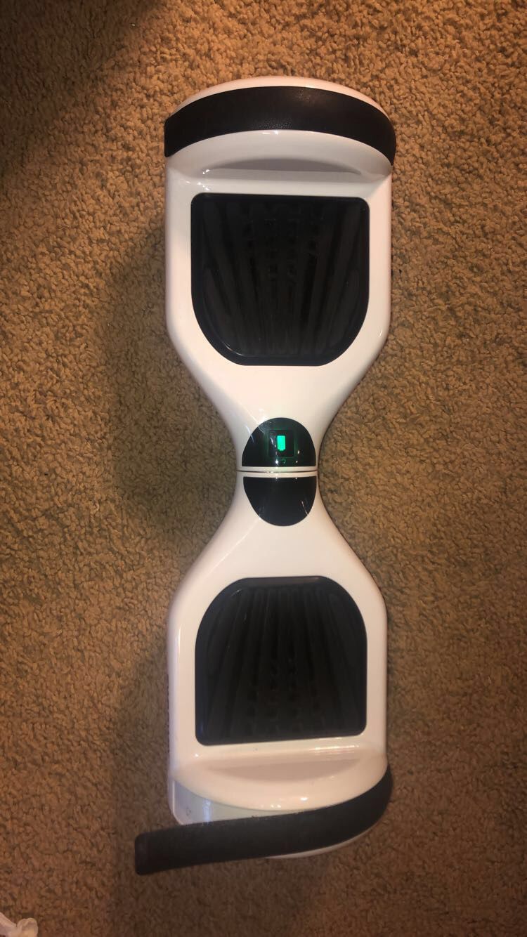 White Swagway Hoverboard with included charger and case
