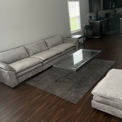 brand new couch, coffee tables, and led fireplace