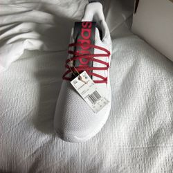 Brand new never used Adidas shoes