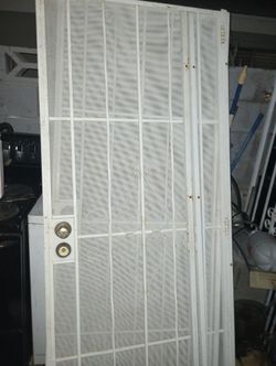 Security. Doors.  301/2.     And 32.  Inches. 79. And 76.  Tall