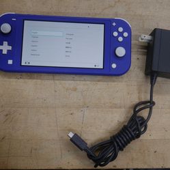 Nintendo Switch Lite Turquoise 32GB Console With Charger HDH-001. used. tested. in a good working order. 