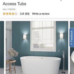 Chand Freestanding Soaker Bathtub with Faucet and Center Drain by Access Tubs