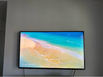 Sharp 50” 4K UHD Smart TV with Wall Mount