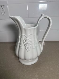 White Ceramic Pitcher with Embossed Grape Design
