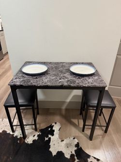 High top table with chairs