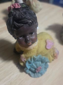Three resinated Black African American children figurine