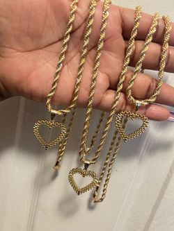 Rolex heart necklace