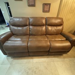 Living room couch With recliner & Phone Charger. 