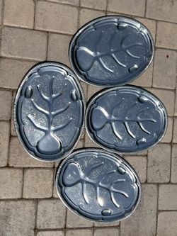 This vintage silver-plated meat serving  trays