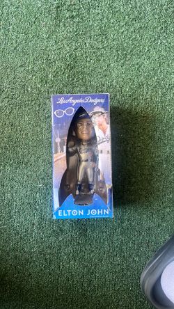 Elton John bobble head  new firm