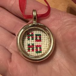  Handmade VTG cross-stitch Christmas Ornament  "HO HO" in a gold-toned Frame