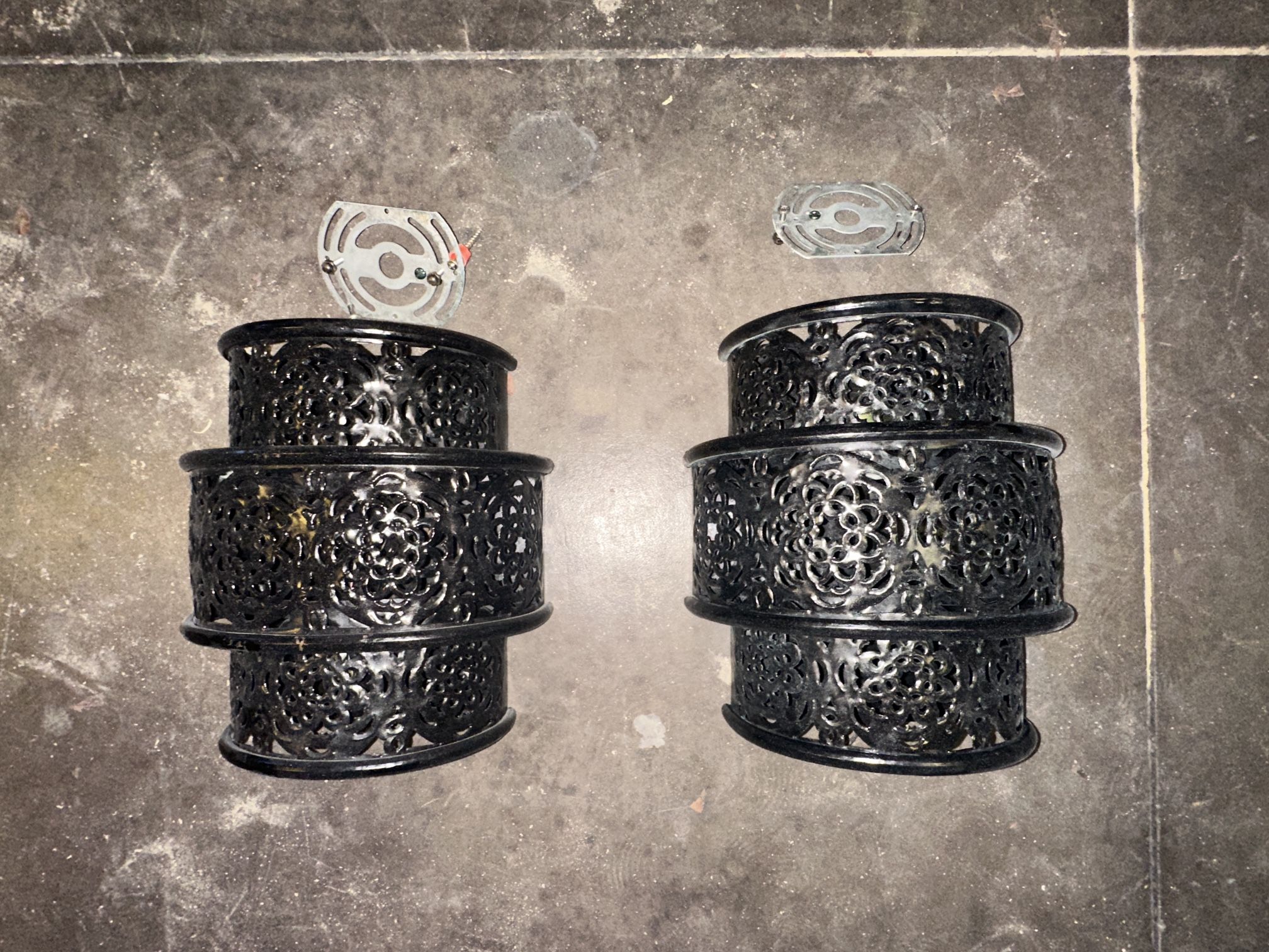 Metal wall sconces sold together