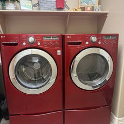 LE Washer And Electric Dryer With Pedestals 