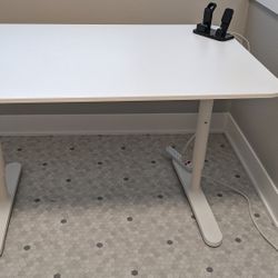 Office Desk Or Table White Color New Condition No Scratches Or Scuffs
Length 48 inch
Width 30 inch
Height - adjustable height
Bought it 6 month back 
