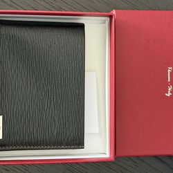 Salvatore Ferragamo wallet.   Brand new !   $220