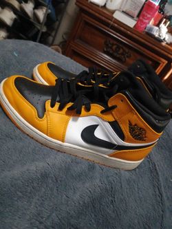 Black and yellow Nikes