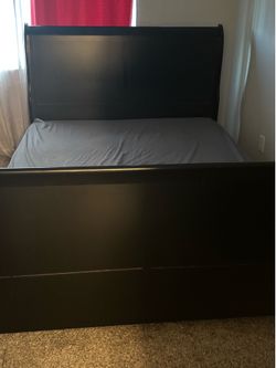 Sleigh bed frame