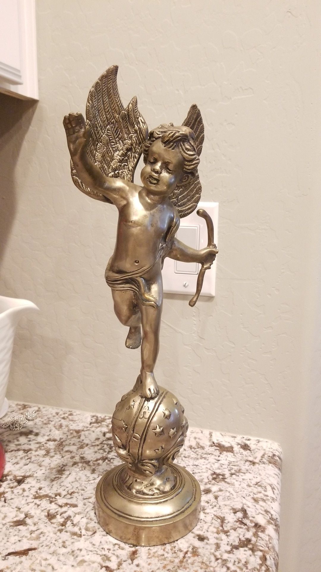 Cupid metal art statue