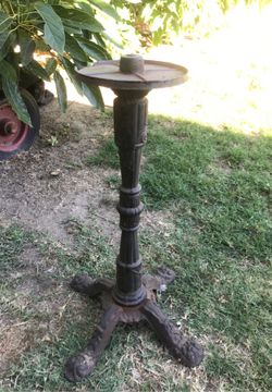 Antique cast iron base.