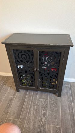 Dark Wood Cabinet with Scroll Fretwork Doors