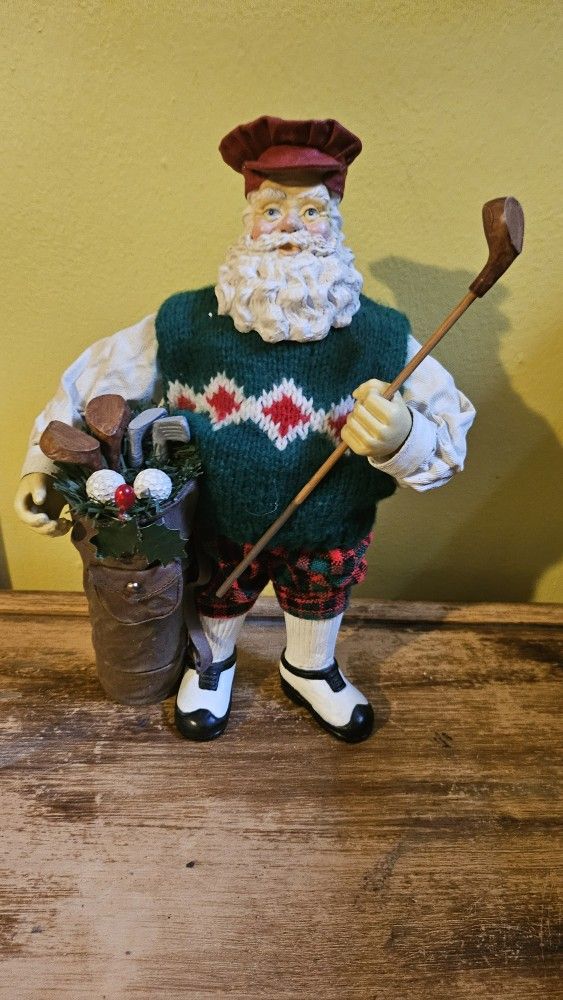Vintage golfing santa