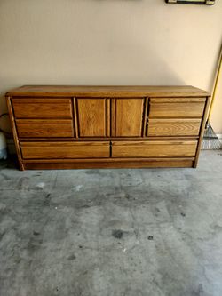 Dresser..Honey Oak..Triple Dresser..70 by 33..Like New