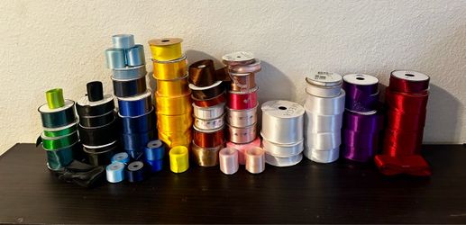 Ribbon, tulle, bouquet wrap and pore-cut ribbon