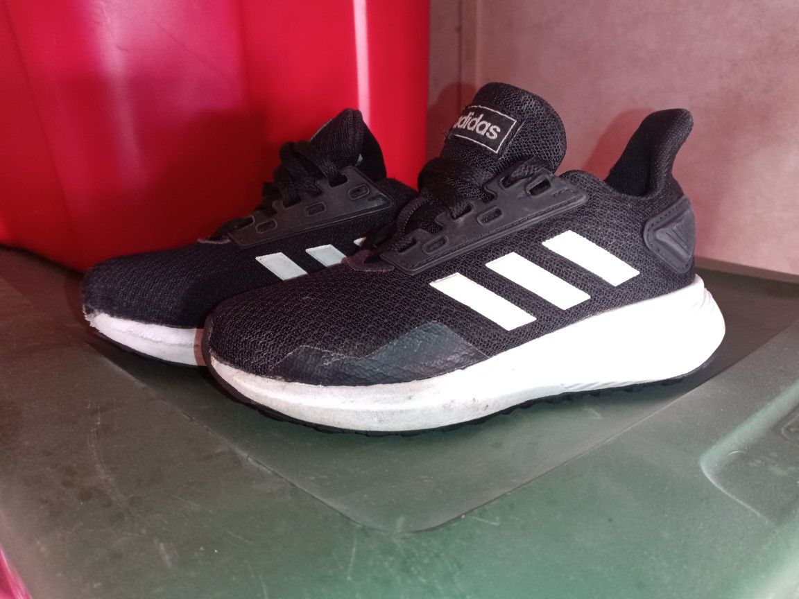 Elevate your child's casual style with these Adidas Cloudfoam Pure sneakers