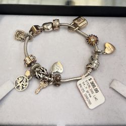 PANDORA BRACELET WITH CHARMS 