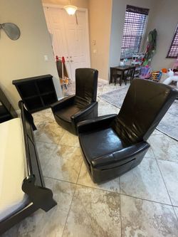 Pair of Black Swivel Fold Down Ottoman Accent Chairs